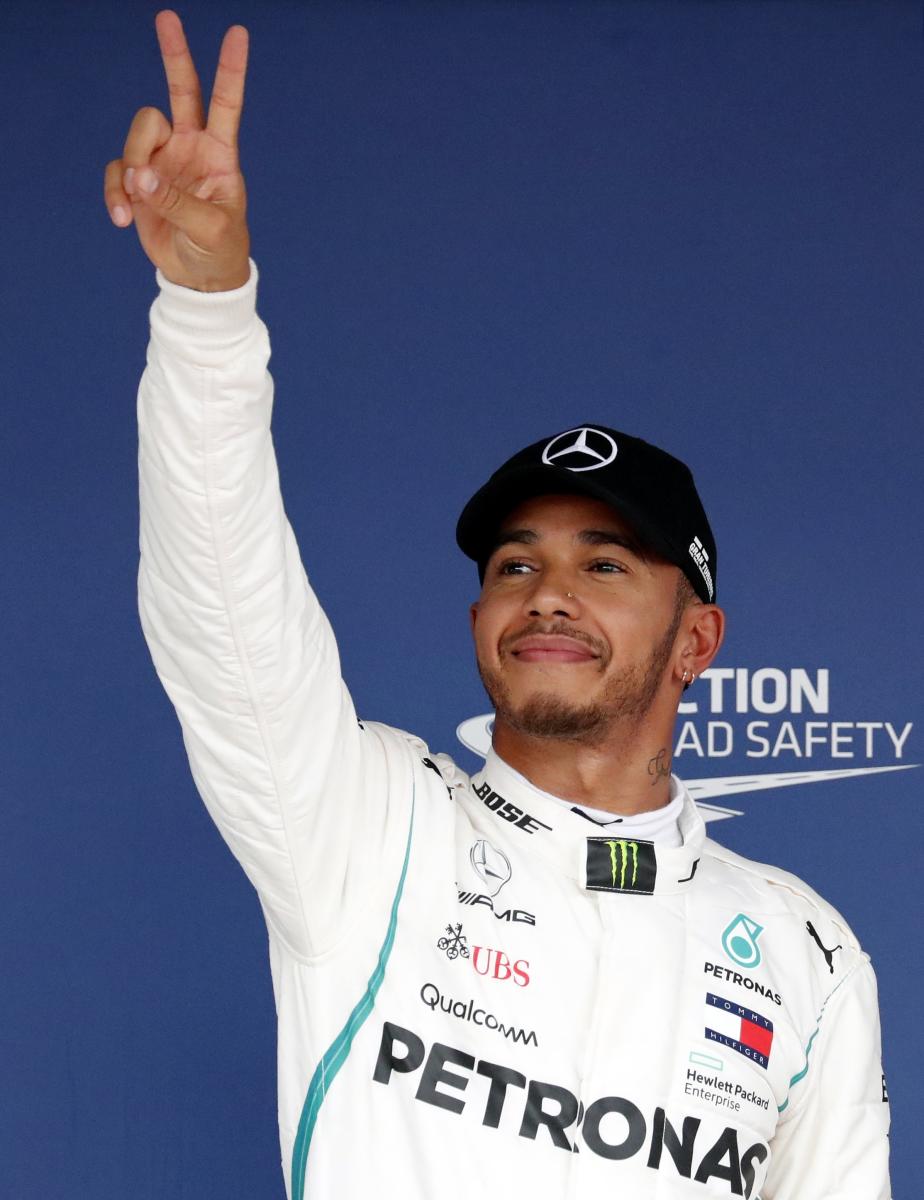 Super Hamilton grabs 80th pole