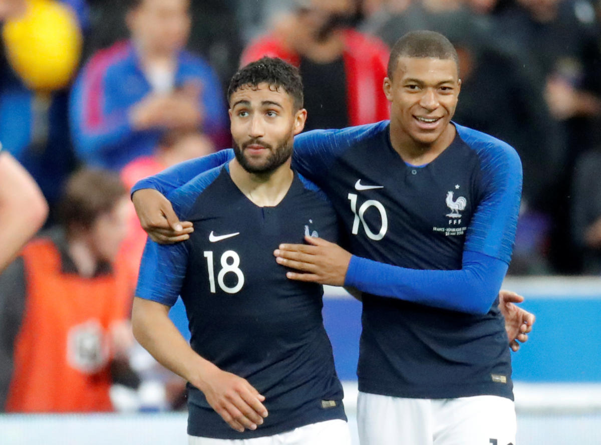 France shine, Portugal stumble in friendlies