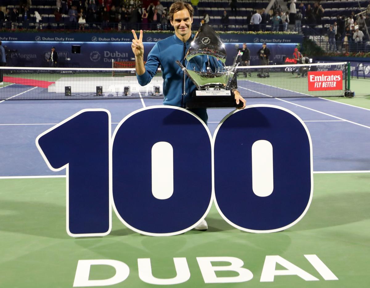 Federer stands tall with his 100th title