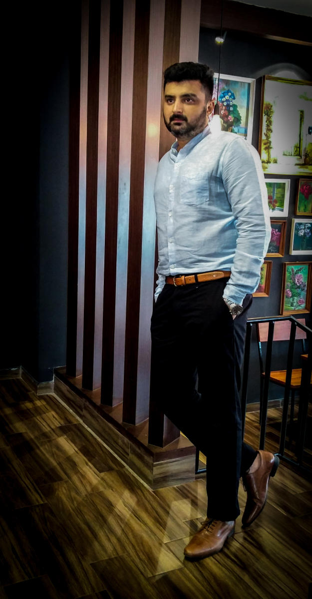 A director who dons many hats