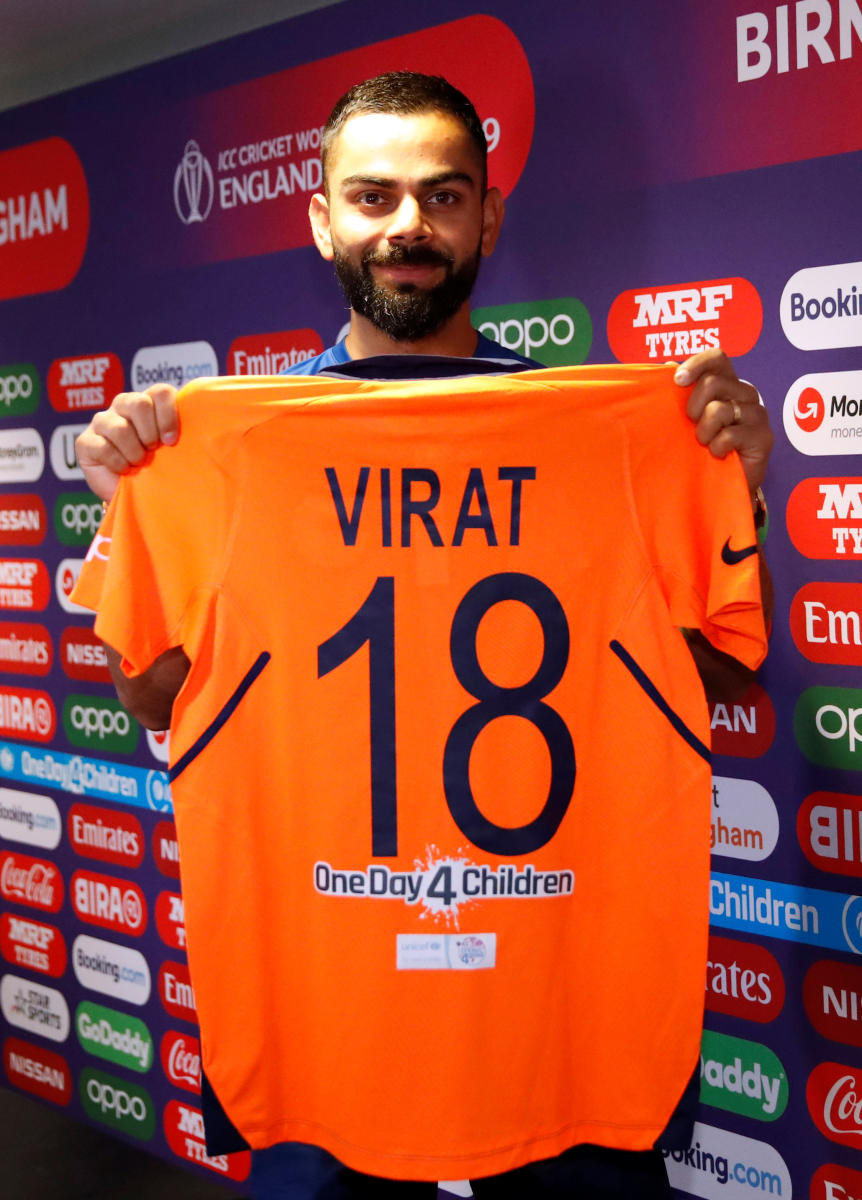 Kohli gives thumbs-up to India's 'smart' orange jersey