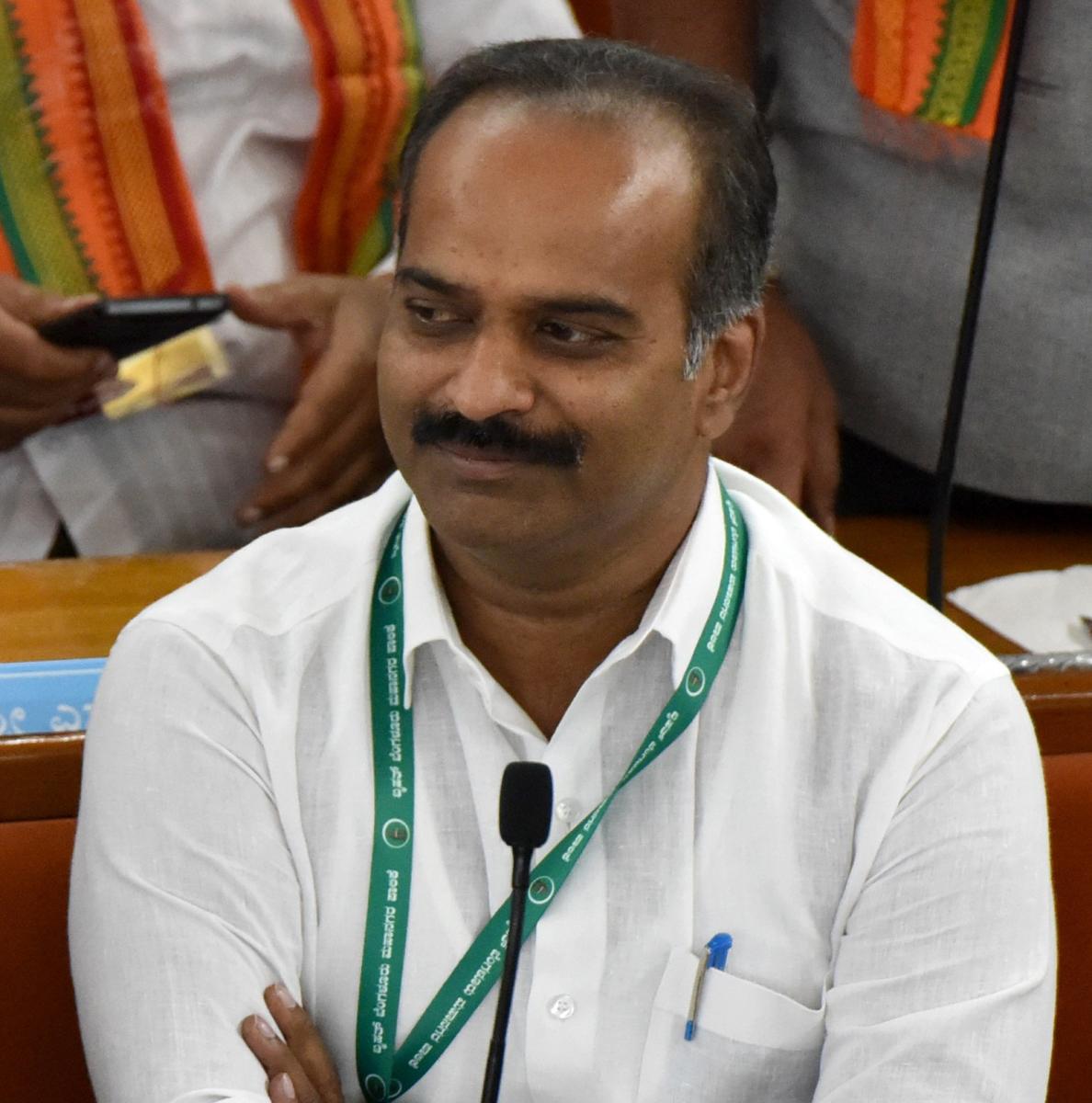 BJP MP P C Mohan told to explain land link