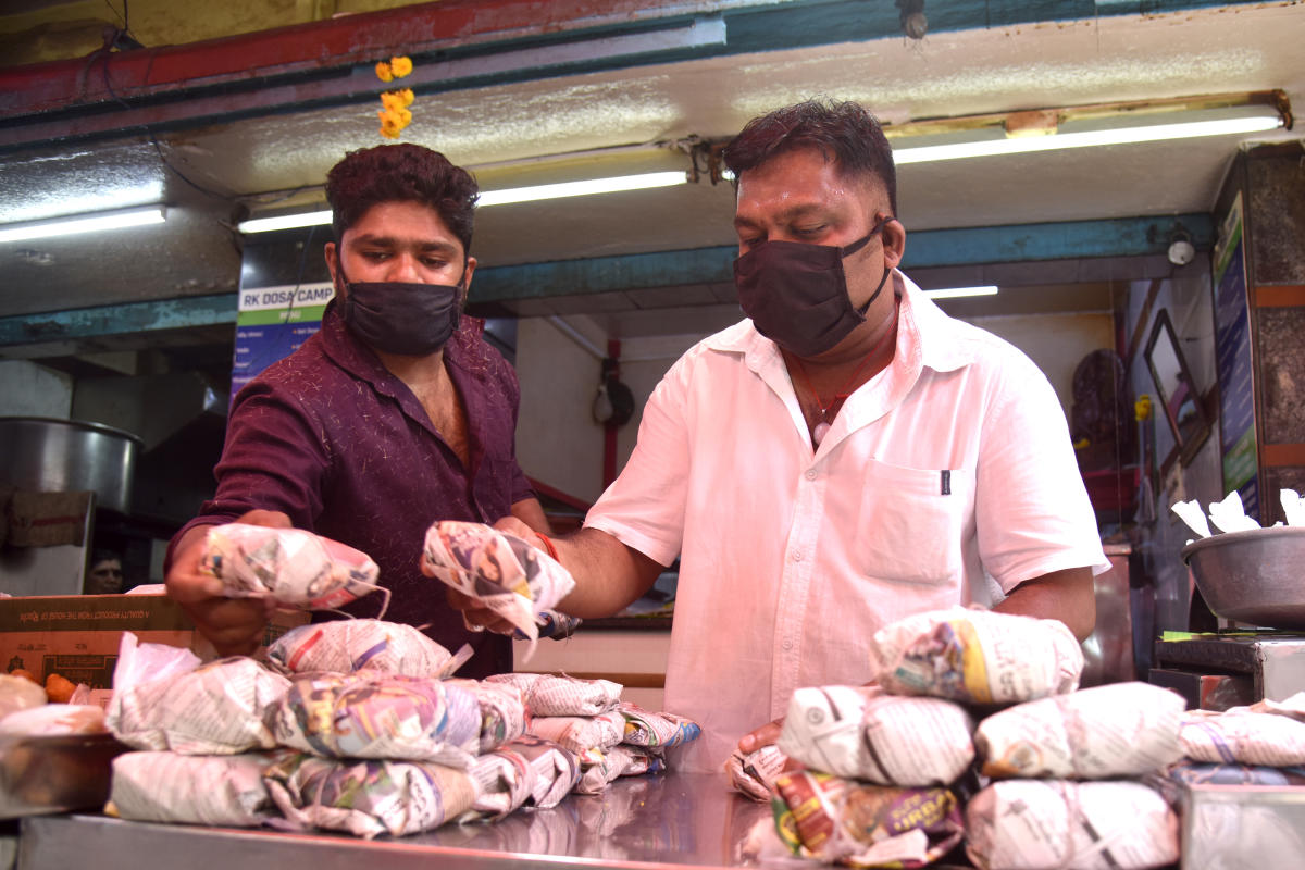 Restaurants pass on parcel charges to customers, and they feel the pinch