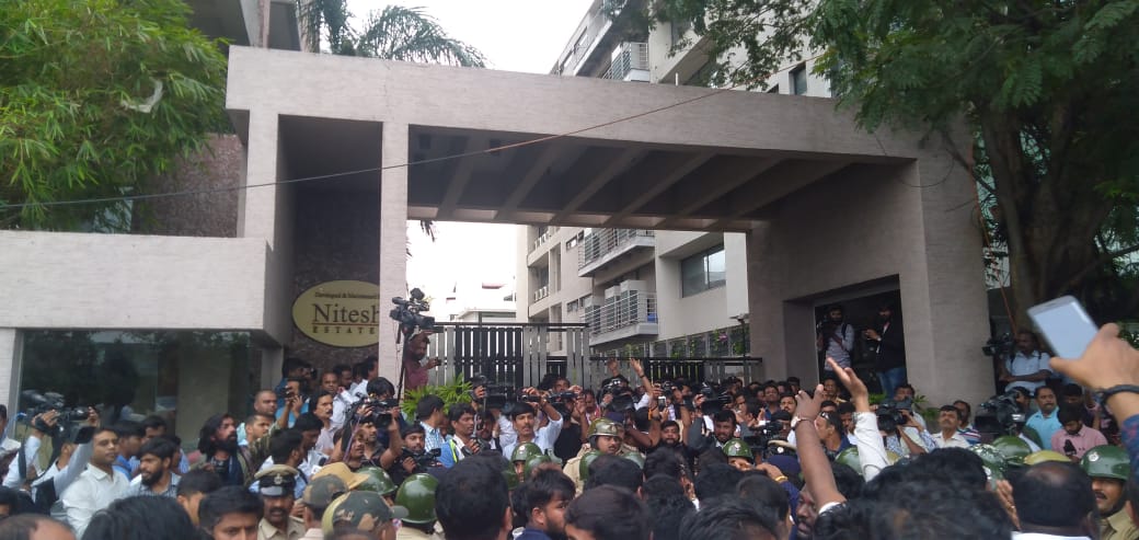 Crowd outside Nitesh Wimbledon Park in MG Road.