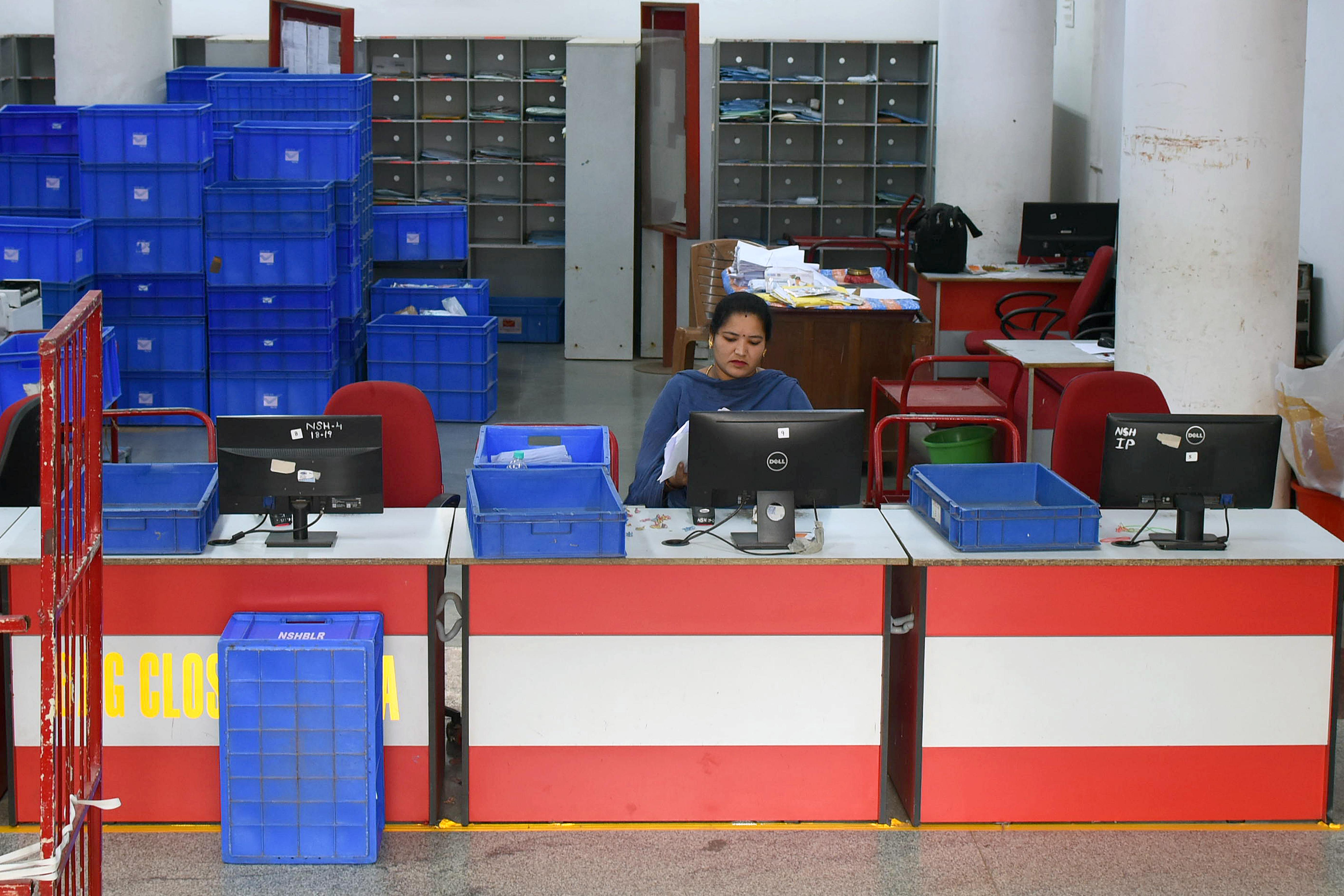 The good old counters where the postal, as well as financial transactions, happen at the GPO which see a footfall of close to a hundred daily. Credit: DH Photo