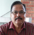 Dr K Puttaswamy