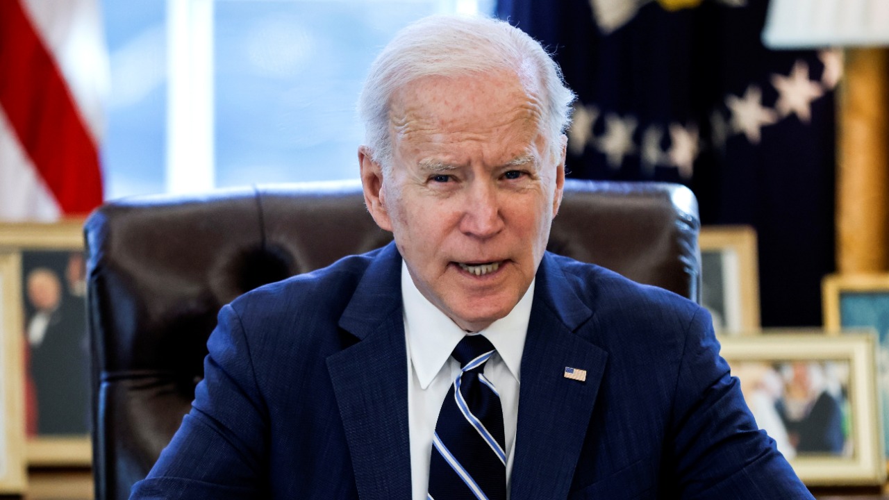 Biden signs $1.9 trillion Covid-19 stimulus into law on US lockdown anniversary