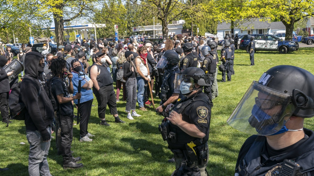 Riot declared after windows smashed in Portland protests