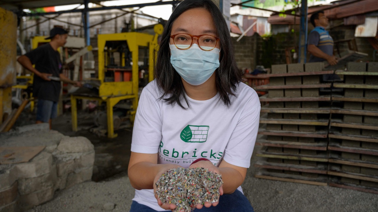 Indonesian women take on plastic waste brick by brick