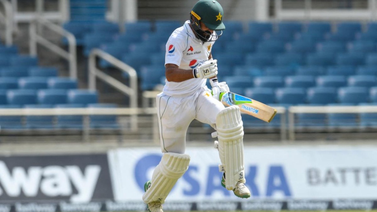 Fawad reaches century for Pakistan as rain again curtails play