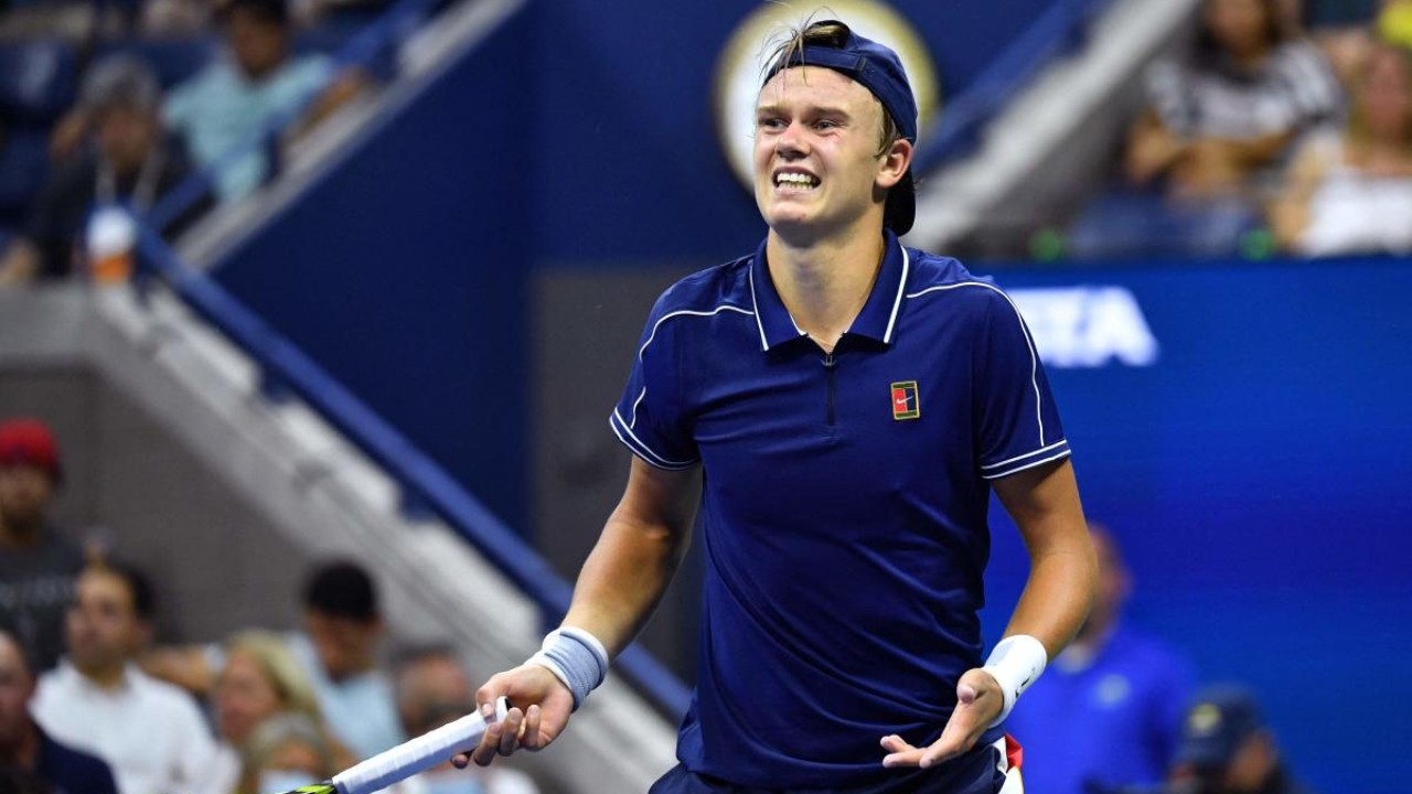 Holger Rune loses to Novak Djokovic but wins over fickle New York crowd