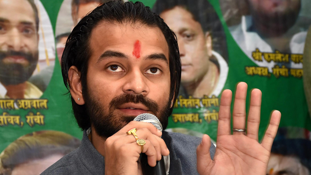 Minutes after Lalu’s return to Patna, Tej Pratap sits on a dharna