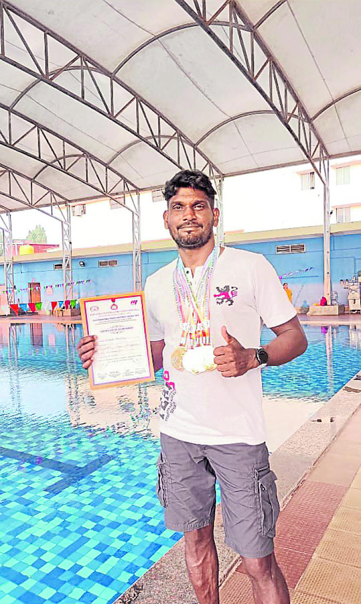 Sandesh Tingalaya wins gold medals in swimming