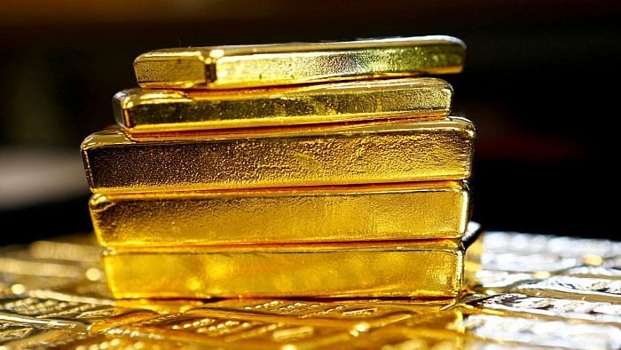 Gold rallies to record high on US government shutdown, Fed rate cut bets