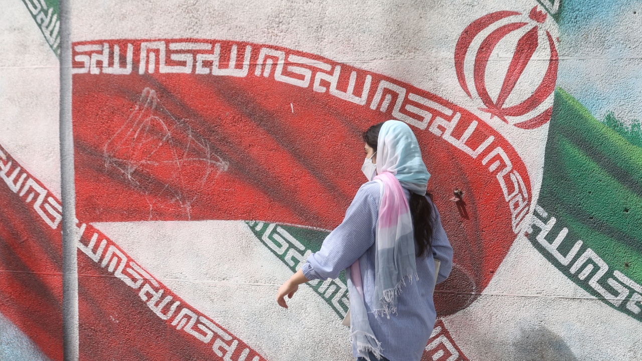 Iran sports boss quits after women compete unveiled