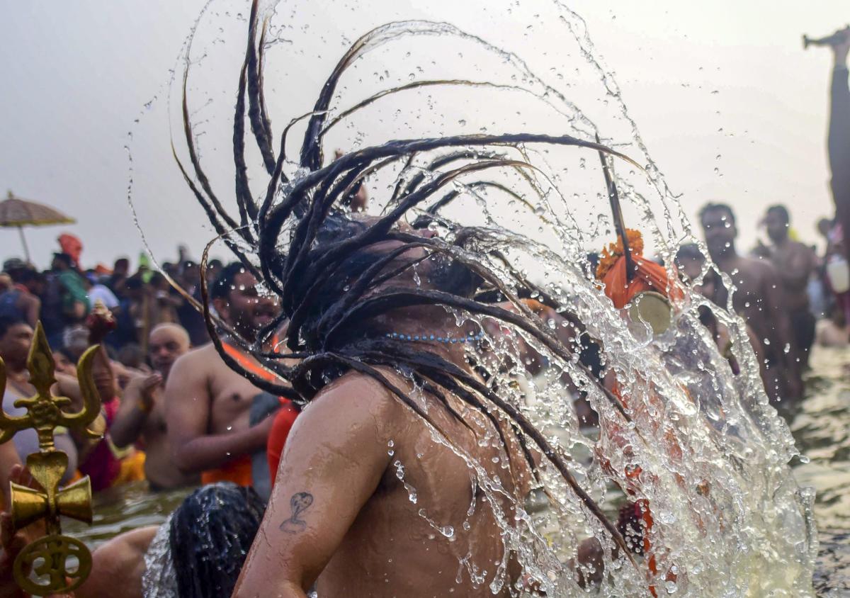A sadhu in river Ganga. PTI Photo