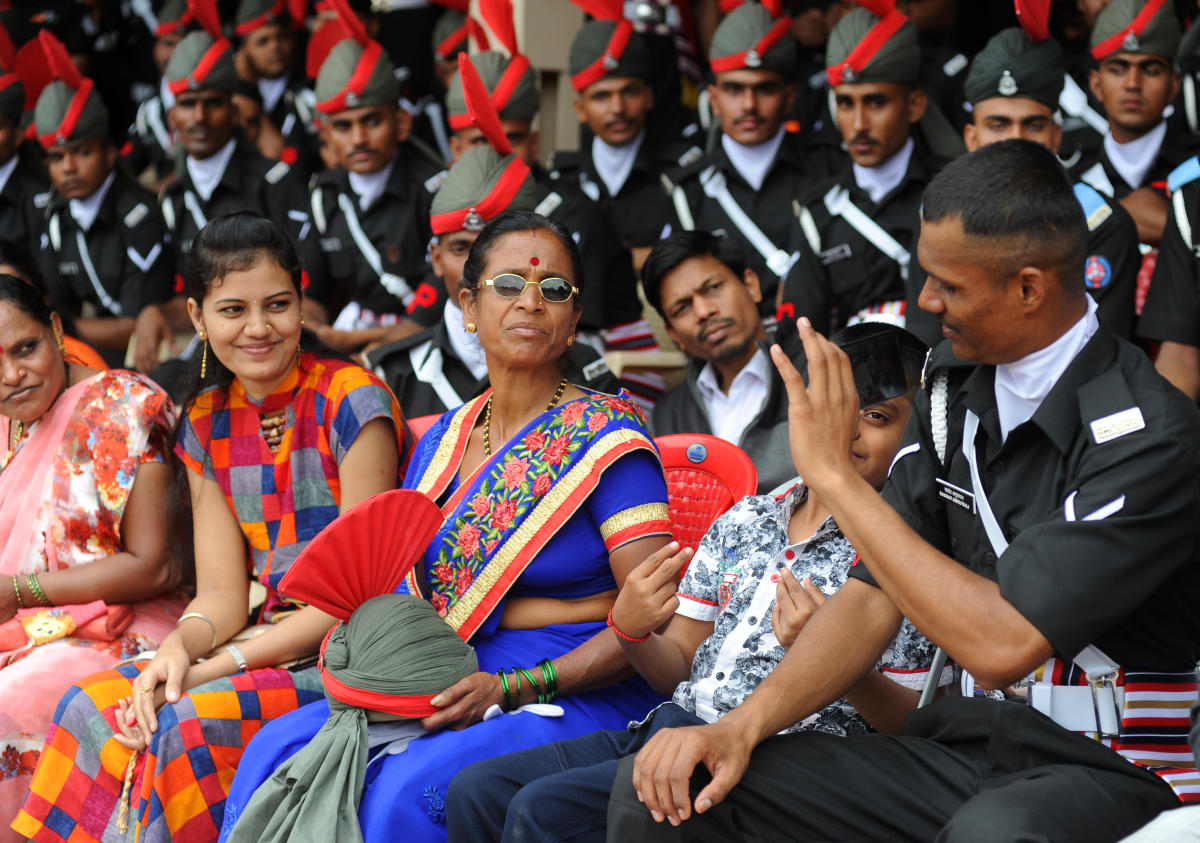 Family members of some of the 94 recruit trainees from the Corps of Military Police who joined the Indian Army with the rank of a regular soldier at a passing out and attestation parade at the CMP Centre and School in Bengaluru. Credit: DH Photo/Pushkar V