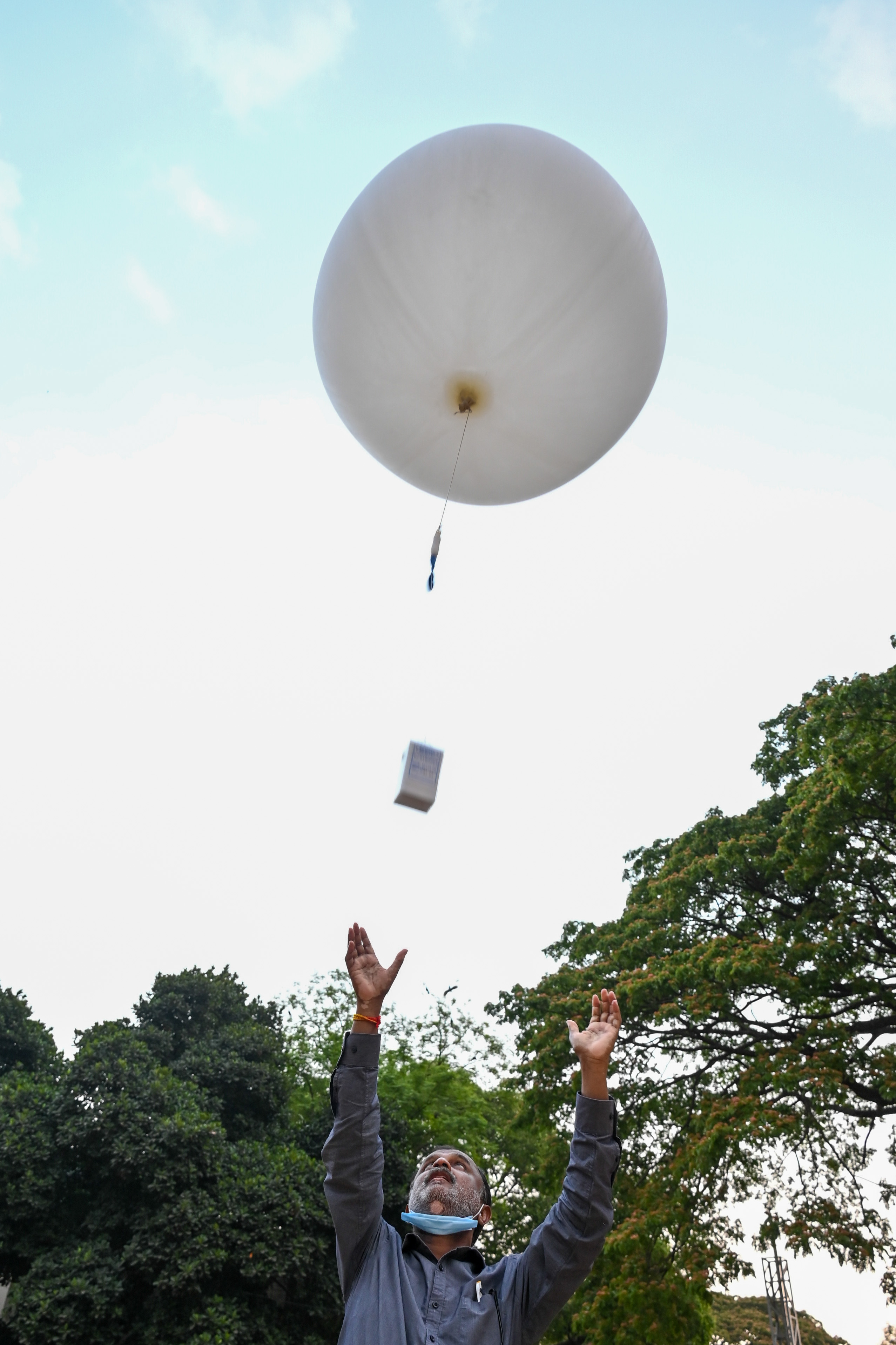Every day, two weather balloons are released to record upper air parameters like wind, clouds and humidity. Credit: DH Photos/Pushkar V