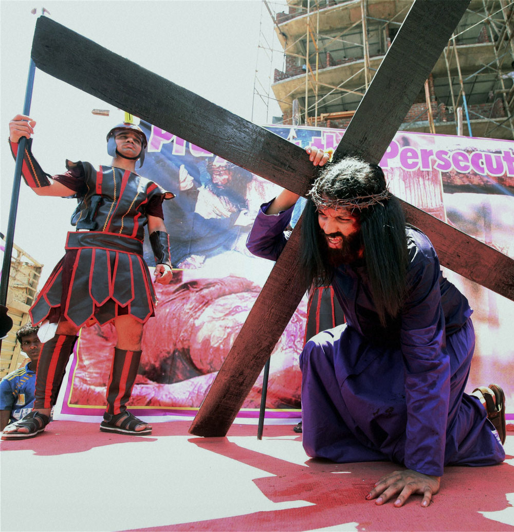 Christian devotees enact the crucifixion of Jesus on the occasion of Good Friday in Mumbai. PTI Photo