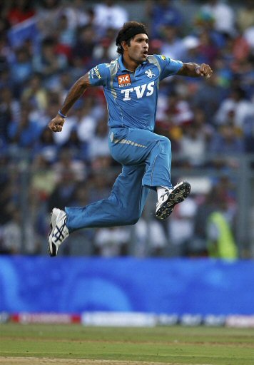 Mumbai:  Pune Warriors bowler Ashok Dinda celebrates the wicket of A  Rayudu of Mumbai Indians during their IPL T20 match in Mumbai on Friday.  PTI Photo by Shashank Parade