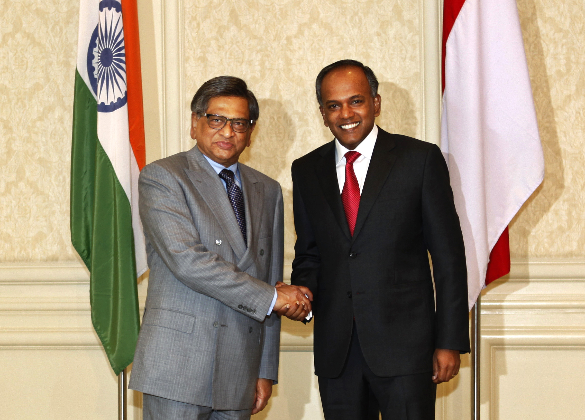 Singaporean Foreign Minister K. Shanmugam, right, shakes hands with Indian counterpart S.M. Krishna before a meeting in New Delhi, India, Tuesday, May 8, 2012. Shanmugam is on a five-day visit to India. AP