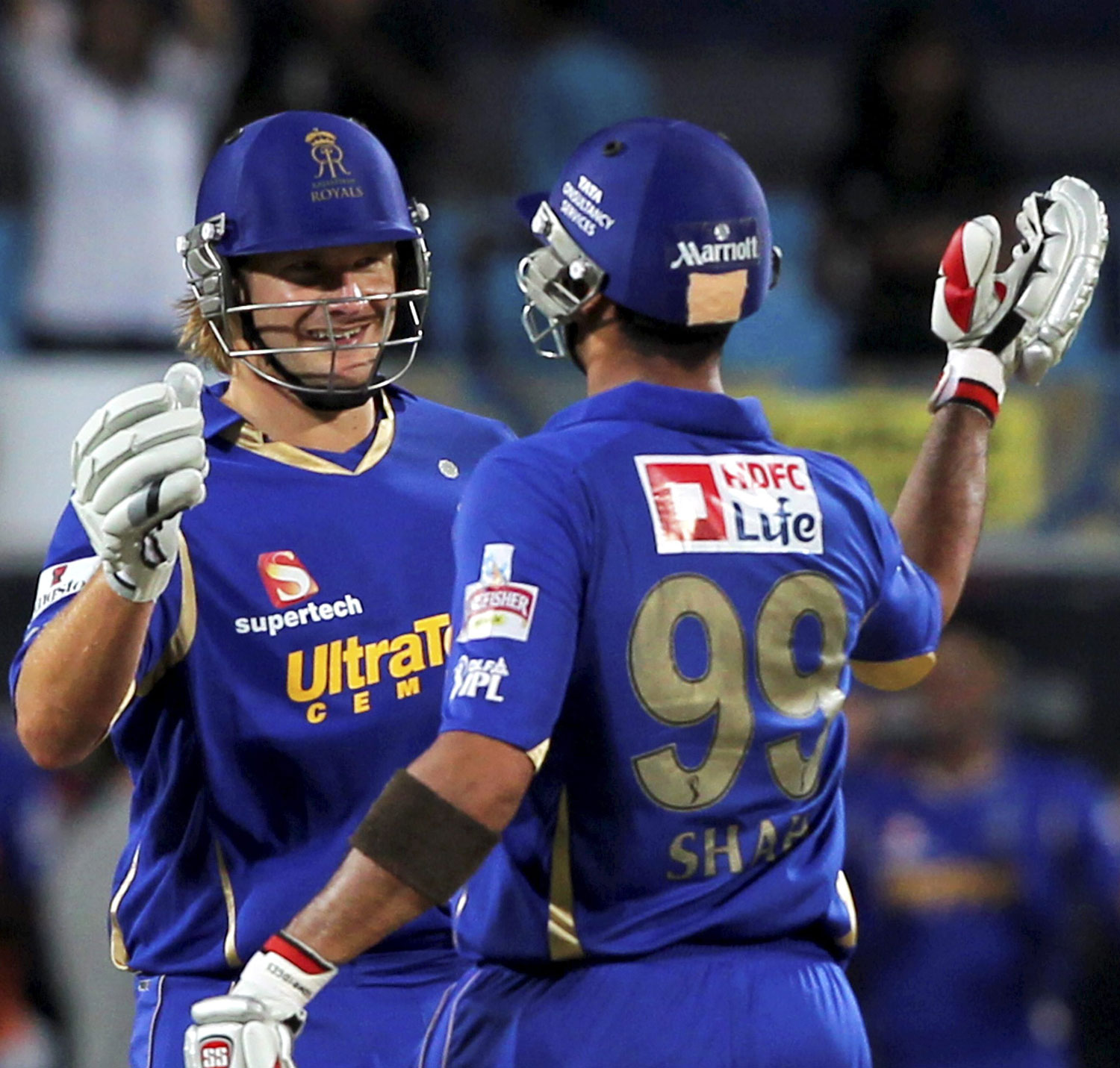 Rajasthan Royals' Shane Watson and Owais Shah celebrate after their win over  Team Pune in IPL-5 match in Pune on Tuesday. PTI