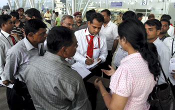 Ahmedabad: Stranded passengers of Air India at Ahmedabad airport after their flight was canceled on Tuesday. PTI Photo 