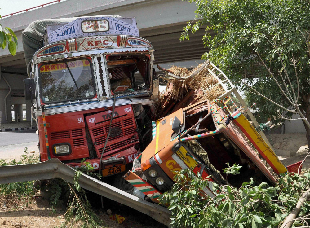 Greater Noida: The damaged trucks after a collision on Greater Noida Expressway on Monday. PTI Photo