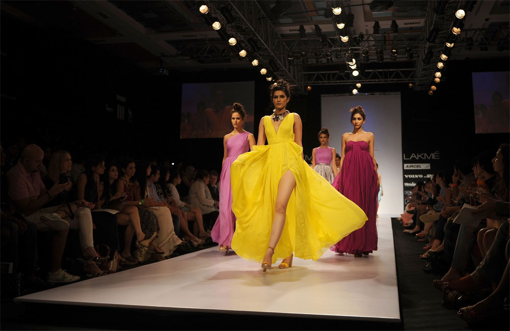 Models showcase creations by designer Drashta on the second day of Lakme Fashion Week (LFW) winter/festive 2012 in Mumbai on August 4, 2012. The LFW, held twice annually, features creations by over 85 designers and will culminate with a grand finale ...