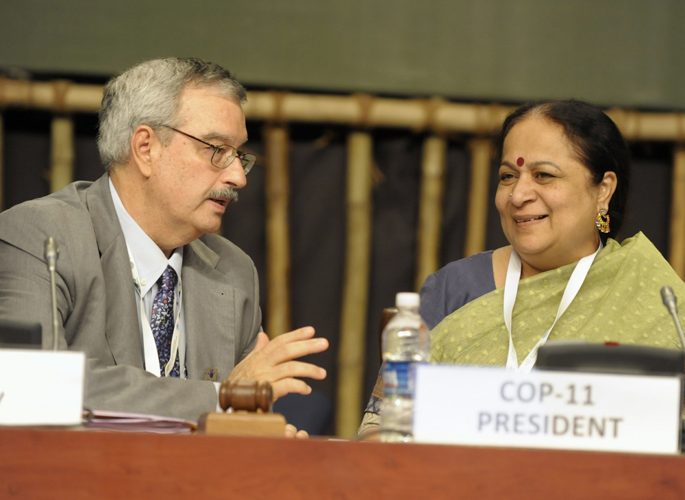 Indian Minister of Environment and Forests, Jayanthi Natrajan (R) talks to CBD Executive Secretary, Braulio Ferreira de Souza during the Convention on Biodiversity (CBD) conference in Hyderabad on October 19, 2012. About 15,000 delegates from over 18...