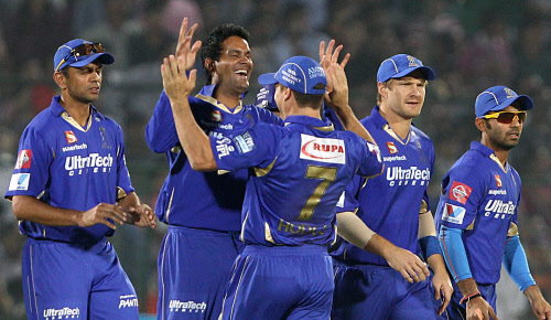 Rajasthan Royals cricketer Ajit Chandila with teammates celebrates the dismissal of Mumbai Indians batsman Ricky Ponting during the IPl6 match in Jaipur on Wednesday. PTI Photo by Shahbaz Khan