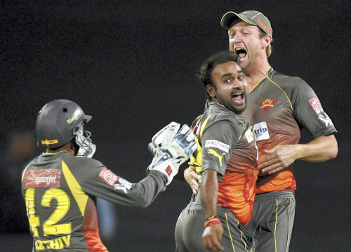 Sunriseres Hyderabad bowler Amit Mishra celebrates his hat-trick and their victroy against Pune Warriors during their IPL match in Pune on Wednesday. PTI Photo by Shashank Parade