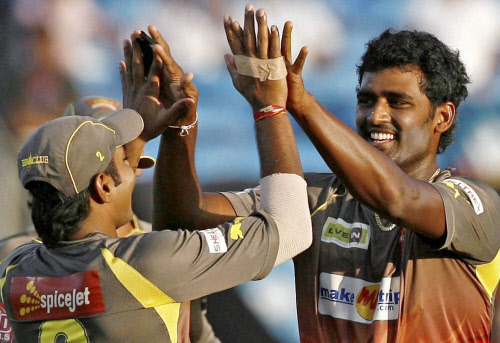 Sunrisers Hyderabad bowler Thisara Perera celebrates the wicket of Pune Warriors batsman Aaron Finch during their IPL match in Pune on Wednesday. PTI Photo by Shashank Parade(PTI4_17_2013_000203A)
