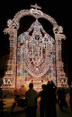 A 50-ft high statue of Lord Balaji that has been made with thousands of LED lights for Ram Navmi in Shirdi on Tuesday. PTI Photo
