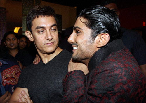 Bollywood actor Aamir Khan and Prateik Babbar at film ISSAQ premiere in Mumbai on Thursday. PTI Photo