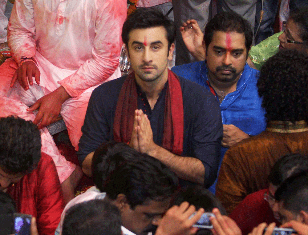 Mumbai: Bollywood actor Ranbir Kapoor and music director Shankar  Mahadevan offering prayers to Lalbaugcha Raja during Ganesh Chaturthi  festival in Mumbai on Wednesday. PTI Photo