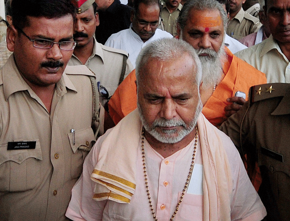 Lucknow: VHP leaders, who were proceeding towards Makhauta for Cahurasi  Kosi Ayodhya Parikrama, being detained by the police at the airport in  Lucknow on Thursday. PTI Photo by Nand Kumar
