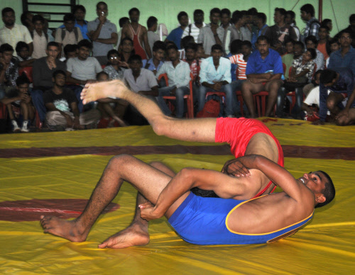 Students participate in Wrestling during Mysore University Inter Collegiate Competitions at Sports Pavilion in Mysore on Thursday. DH Photo