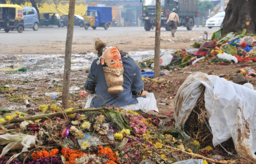 Broken Idols after immersed with garbage seen at Ulsoor lake in Bangalore on Thursday. DH Photo by B K Janardhan