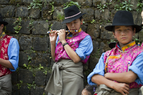 Students of the Tibetan Children's Village School wear traditional costumes as they wait to perform a dance during the school's anniversary celebrations in Dharmsala, Wednesday, Oct. 23, 2013. The school, which started as an orphanage in 1960, houses...