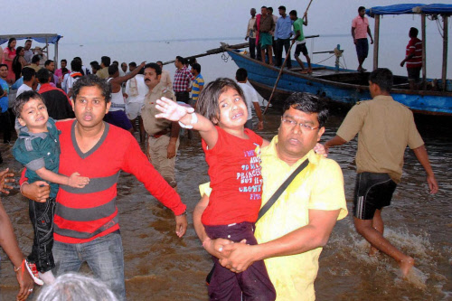 People rush victims of drowned boat to a hospital in Sambalpur district  of Odisha on Sunday.   Few people are feared dead and many went missing  after a boat carrying 90 people capsized on the Hirakud reservoir in  Odisha.    PTI Photo