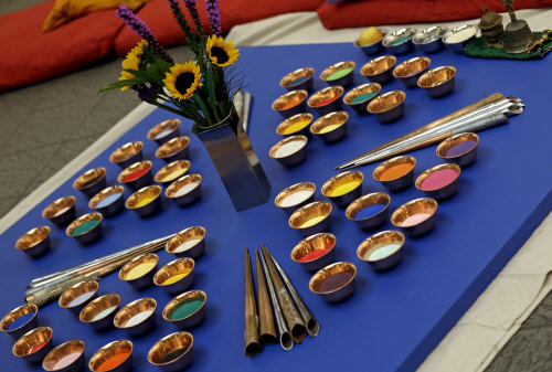 Colored sand and metal funnels called chakpurs, lie ready for sand painting by Buddhist monks from the Drepung Gomang Monastery in India during the opening ceremony of the Sacred Arts Tour at The ArtsCenter, Sunday, Feb. 9, 2014, in Carrboro, N.C. Th...