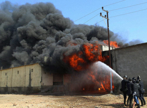 Firefighters battle a fire at Chemical godown in Bhivandi, Mumbai on Thursday. PTI Photo 