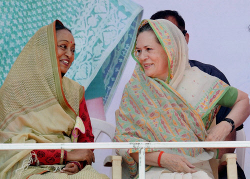 Congress President Sonia Gandhi with party Lok Sabha candidate Meira Kumar during an election rally in Sasaram on Thursday. PTI Photo