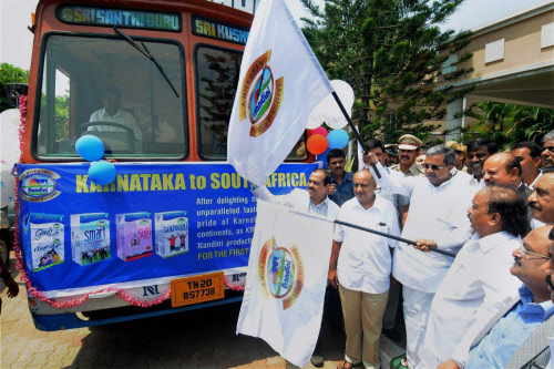 Bengaluru: Siddaramaiah flags off a bus to create awareness among people on use of milk products on the occasion of World Milk Day in Bengaluru on Monday. PTI Photo