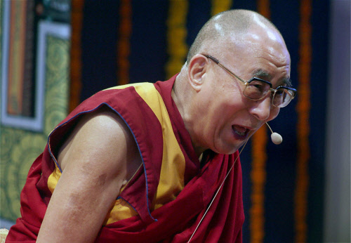 Mumbai: Tibetan spiritual leader the Dalai Lama interacts with students at a college in Mumbai on Monday. PTI Photo