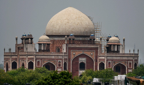 New Delhi: Scaffolds fixed for the restoration work on the century-old dome of Humayun’s Tomb, which was damaged during  Friday's squall, in New Delhi on Monday. PTI Photo by Atul Yadav