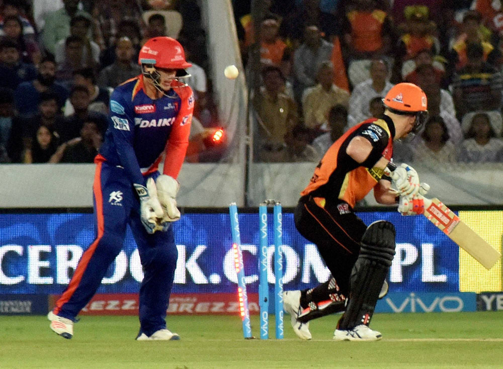 Sunrisers Hyderabad captain David Warner gets clean bowled against Delhi Daredevils during IPL cricket match in Hyderabad on Thursday. PTI Photo