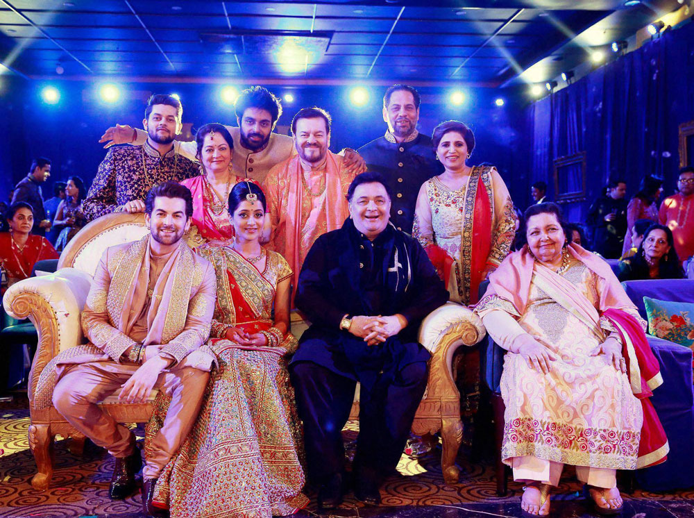 Close family friends Rishi Kapoor and Pamela Chopra at actor Neil Nitin Mukesh and Rukmini Sahay's grand wedding ceremony at Sajangarh Fort in Udaipur on Wednesday. PTI Photo