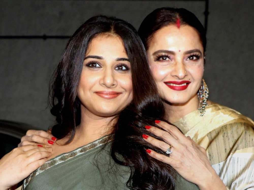  Bollywood actress Rekha (L) and Vidya Balan attend the special screening of the comedy-drama 'Tumhari Sulu' in Mumbai on Tuesday.